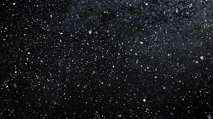 Obraz premium Professional Black Background with Stylish Speckled Effect for Creative Design Projects