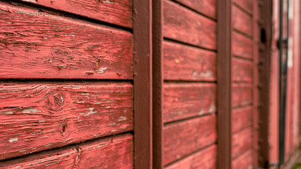 red wooden railway cart door