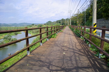 Fototapeta premium Wooden Boardwalk on the Seomjingang Bike Path