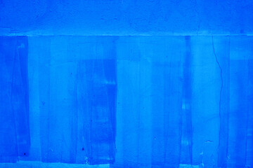Blue concrete wall as grunge texture and background