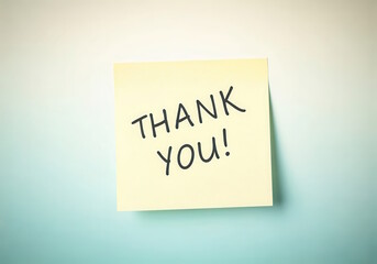 Yellow sticky note with handwritten THANK YOU message, gratitude appreciation concept