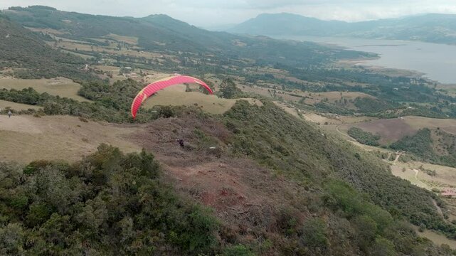 Paragliding hobby flying above the clouds enjoying leisure time couple gift experience extraordinary
