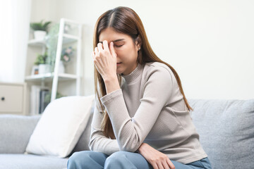 Depressed anxiety asian young woman, girl frustrated closed eyes, touching nose suffering stressed,...