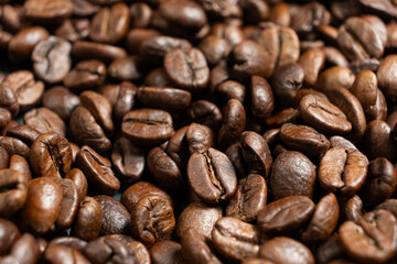 Decaffeinated coffee beans roasted close up
