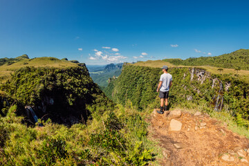 Man in Espraiado canyon park in Santa Catarina, Brazil.