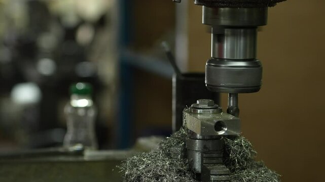 VDO 4K Lathe is working on turning metal parts for industrial use.