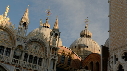 Stunning architectural details of St. Mark's Basilica in Venice during golden hour
