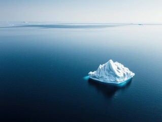 Arctic icebergs drifting in a deep blue sea, crisp cold atmosphere with dramatic lighting
