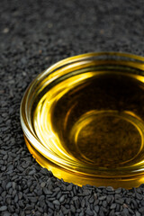 Unrefined cold pressed sesame oil in a glass bowl.