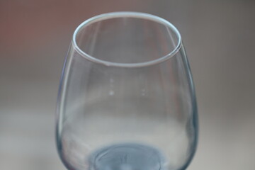 A close-up shot of a wine glass on a table, perfect for highlighting wine or dining products.