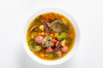 Enjoy a vibrant bowl of veggie soup with fresh ingredients and sausage, perfect for cozy days