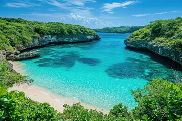 Secluded tropical beach cove with crystal-clear turquoise water, surrounded by lush green cliffs.