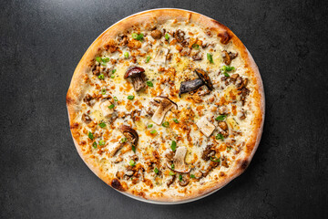 Freshly baked pizza adorned with savory mushrooms and herbs, ready to be enjoyed