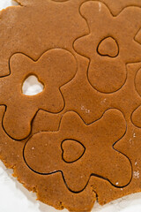 Preparing and Baking Classic Gingerbread Cookies in Gingerbread Man Shapes