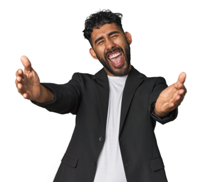 Hispanic businessman in suit in studio feels confident giving a hug to the camera.