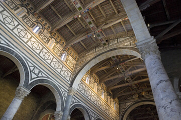 Obraz premium Interior of the medieval church of San Miniato in Florence with stone walls and decorated wooden ceiling (Tuscany-Florence-Italy)