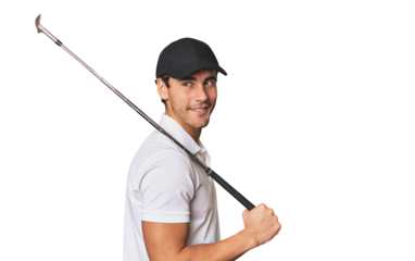 Young Hispanic man with golf club looks aside smiling, cheerful and pleasant.