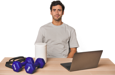 Hispanic trainer planning workout blows cheeks, has tired expression. Facial expression concept.