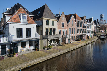 Historic canal houses along the waterfront in Dokkum, Netherlands