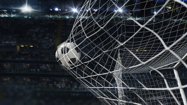 Soccer ball in soccer goal net in a big stadium isolated on big stadium. soccer net.