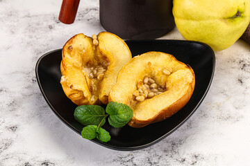 Baked quince with honey and cedar