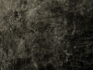 Black dark grunge textured concrete wall background. Abstract wall texture for design, editing, overlays, and digital projects.
