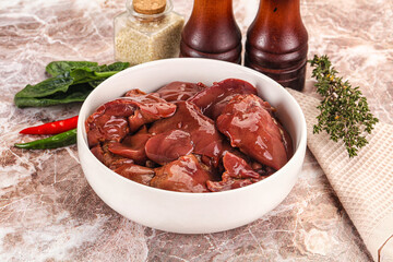Raw uncokked chicken liver in the bowl