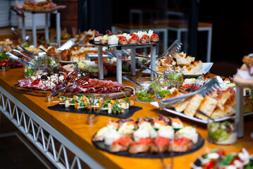 Colorful buffet assortment of canapes at an elegant event showcasing culinary artistry and creativity