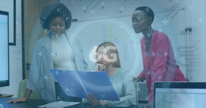 Three women collaborating at office with 5G technology animation overlay