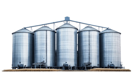 Obraz premium Five metal grain silos storing harvested crops in cultivated field with transparent background