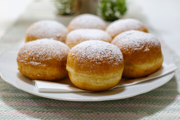 Fresh baked homemade donuts on the table