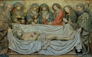 Naklejka premium Stone bas relief (16th century) of the entombment of Christ.