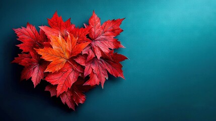   A teal-green background features a heart-shaped arrangement of red leaves and includes space for text or images