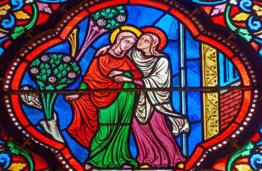 Stained glass (19th century) of Visitation of the Virgin Mary to her pregnant cousin Elizabeth.
