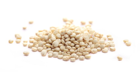 Raw white quinoa seeds isolated, side view and macro