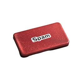 A sparkly red button labeled Spam unwanted email alert