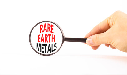 Rare earth metals symbol. Concept words Rare earth metals in beautiful magnifying glass. Beautiful...