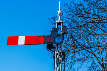 Retro or old fashioned railway signal, British semaphore train signal