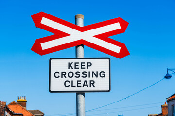 Train station sign Keep Crossing Clear, UK Train crossing sign, Railway warning signpost