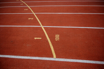 Red running sport track background and texture. Sport running track concept.