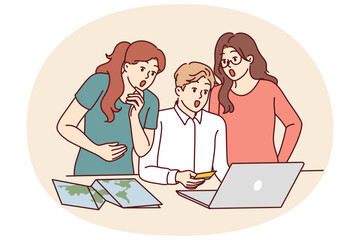 Amazed friends with credit card shopping online choosing travel package or hotel for shared vacation. Travelers who book hotel or apartment online benefit from low prices or big discounts