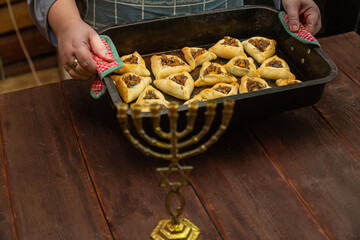 Sweet pastries triangular gomentashi ears of aman for the holiday of Purim