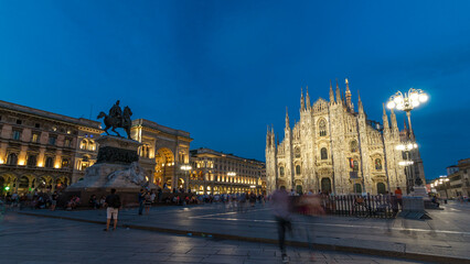 Fototapeta premium Milan Cathedral day to night timelapse Duomo di Milano is the gothic cathedral church of Milan, Italy.