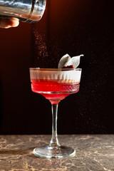 Red alcohol  cocktail with raspberry 