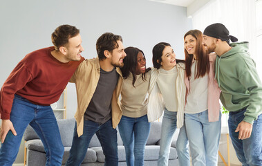 Fototapeta premium Happy group in friendship, friends unity, diverse students team at home, people showing coomon support, active multinational cheerful best spend time together, enjoy life weekend having fun, bond