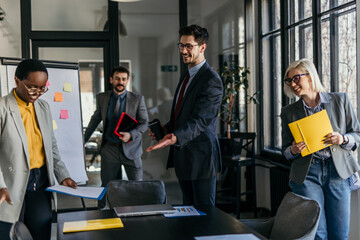 Diverse team members exchanging ideas during a strategy session