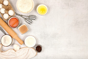 Cooking ingredients for making pie and bread, recipe with eggs, flour, sugar, honey, cinnamon,...