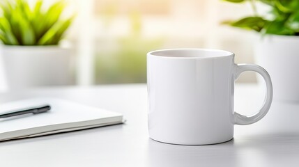 White mug on a table next to a notebook and pen, with plants in the background. Soft, bright lighting