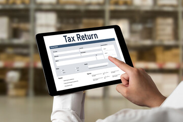 Online tax return form for submitting individual income tax return form snugly on the internet website. Government web for tax payment and return. Taxation technology concept.