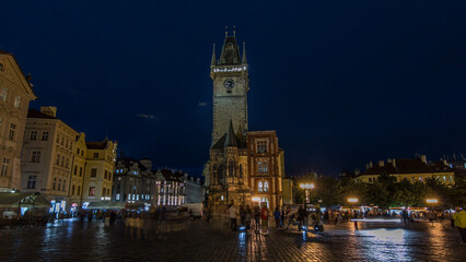 Prague Old Town Hall at Night timelapse hyperlapse with unrecognizable tourists walking